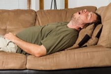 Snoring-man-on-beige-sofa-1500-x-1000-1068x712.jpg