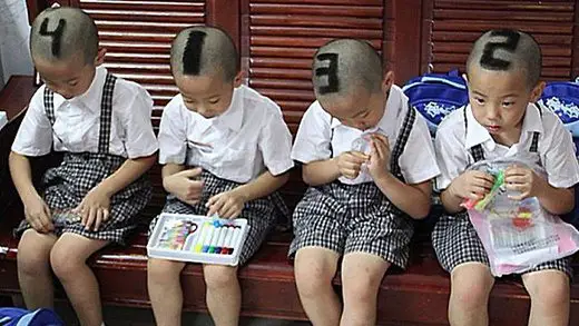 content_quads457996-china-education-quadruplets-with-numbers-on-heads.jpg