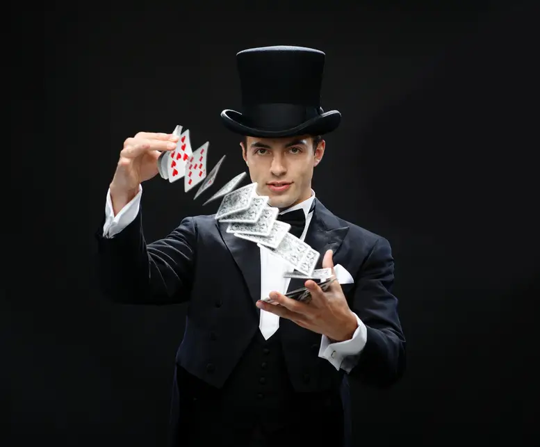 magician-showing-trick-with-playing-cards.jpg