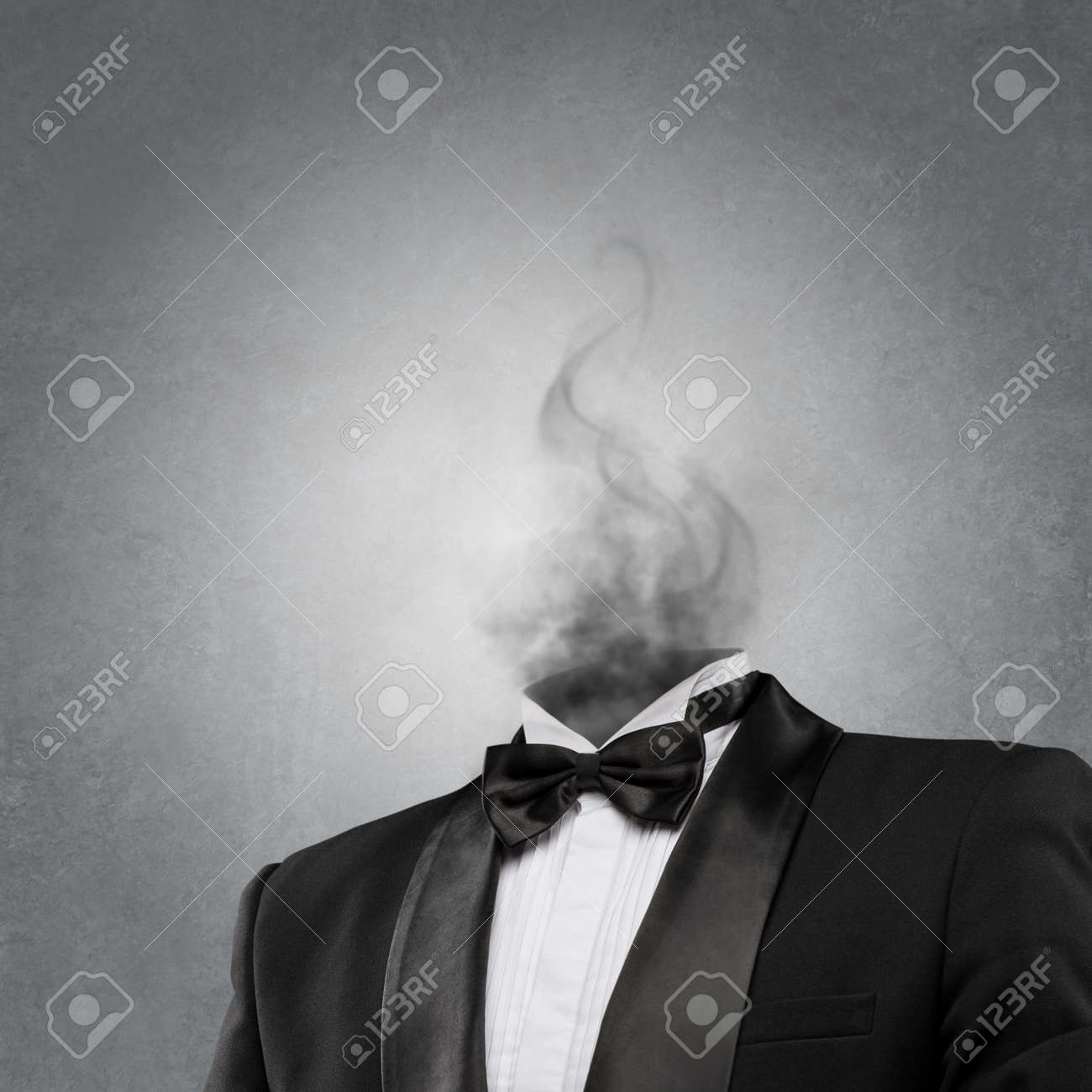 29711693-Overworked-burnout-business-man-standing-headless-with-smoke-instead-of-his-head-Strong-stress-conce-Stock-Photo.jpg