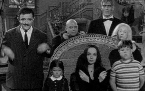 Addams-Family-Finger-Snap-Reaction-Gif.gif